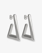 Open triangle silver statement earrings angled side view