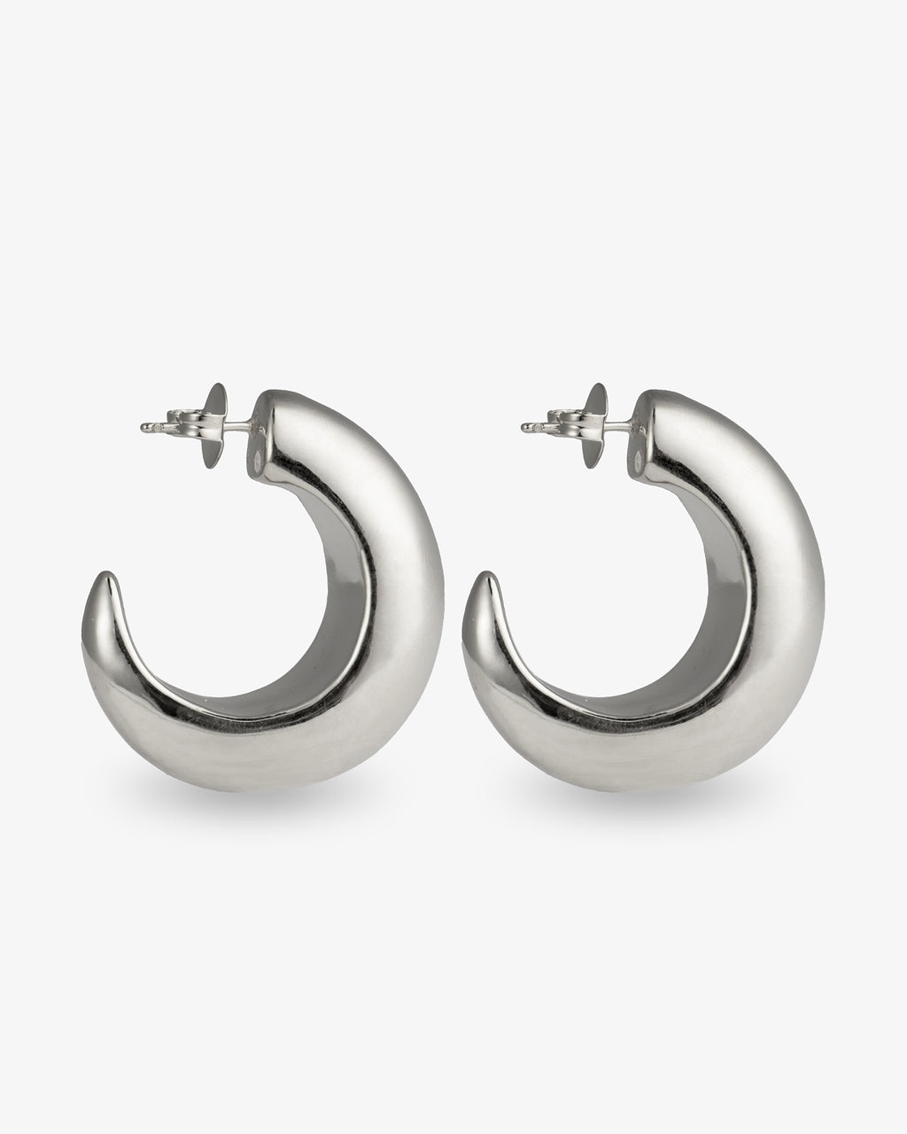 Chunky sculptural silver hoop earrings angled side view