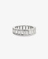 Silver baguette simulated diamond eternity ring with an open cage-style band, alone product shot on a plain background.